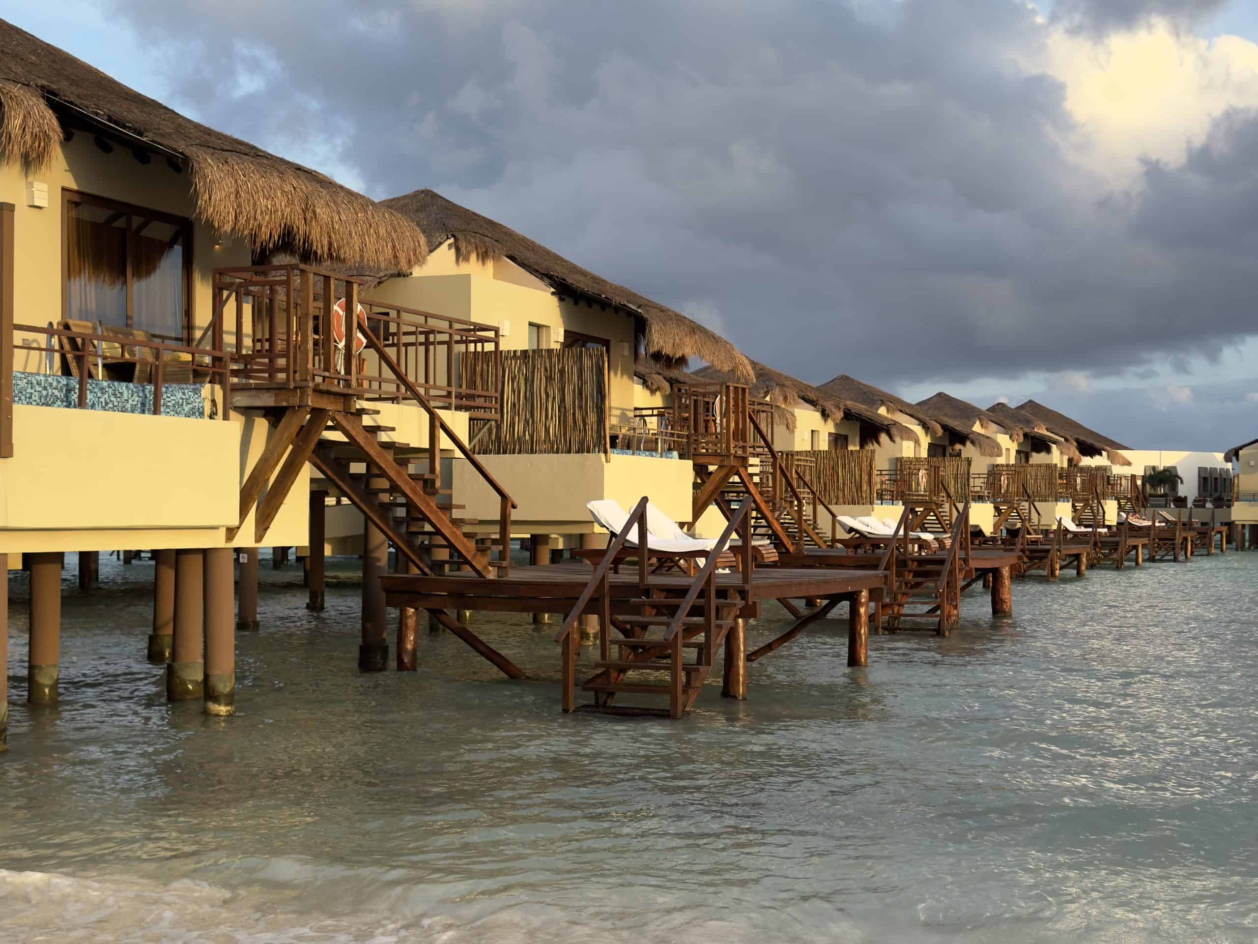 Picture of the Palafitos overwater bungalows at sunset