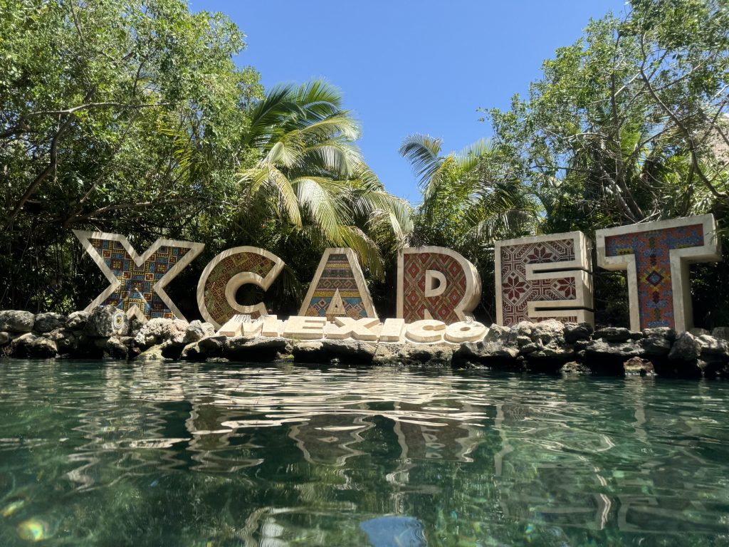 Colorful Xcaret sign at the river exit