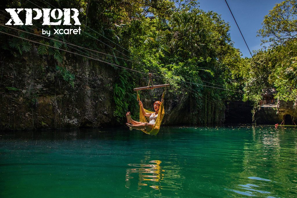 Hammock zip line into a cenote